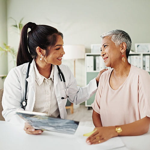 woman talking to doctor